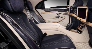 The crocodile leather upholstery in tones of beige and navy