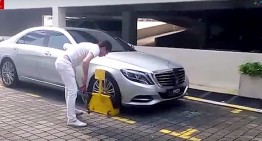 Man beats up security guard after his S-Class gets clamped