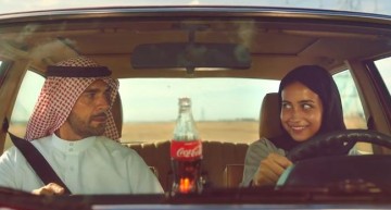 Girl driving a Mercedes-Benz in the latest TV ad promoting women behind the wheel in Saudi Arabia
