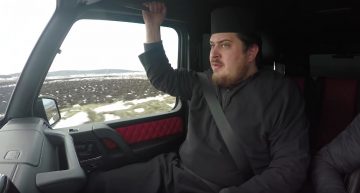 Say your prayers. Priest in a fast ride onboard the G-Class