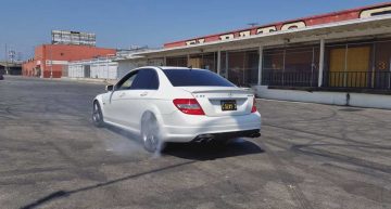 9-year old kid does burnouts with his dad’s Mercedes-AMG C 63
