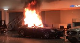 Rioters torch cars in a Mercedes-Benz dealership during protests in the U.S.