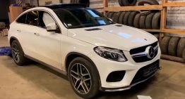 Mercecedes-Benz GLE Coupe becomes a write off after truck tire explodes next to it