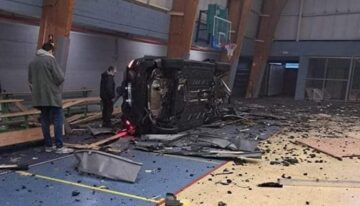 Mercedes Driven By Soccer Player Flies 100 Feet, Goes Through Sports Hall Wall